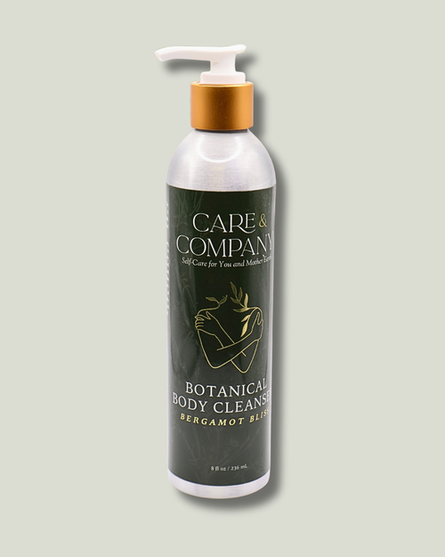 Bottle of Care & Company Botanical Body Cleanser on a gray background